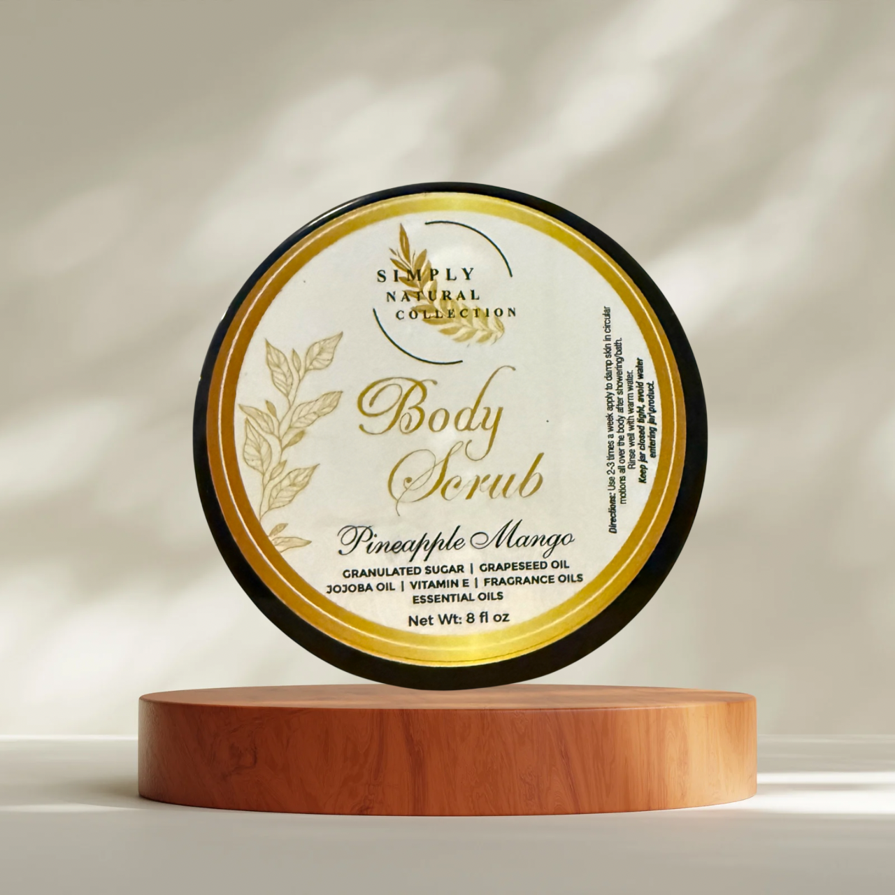 Pineapple Mango Body Scrub by Simply Natural Collection in gold and white  jar