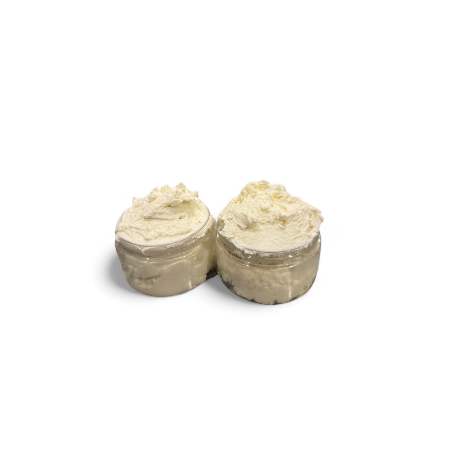 Two small jars of whipped hair butter  on a white background.