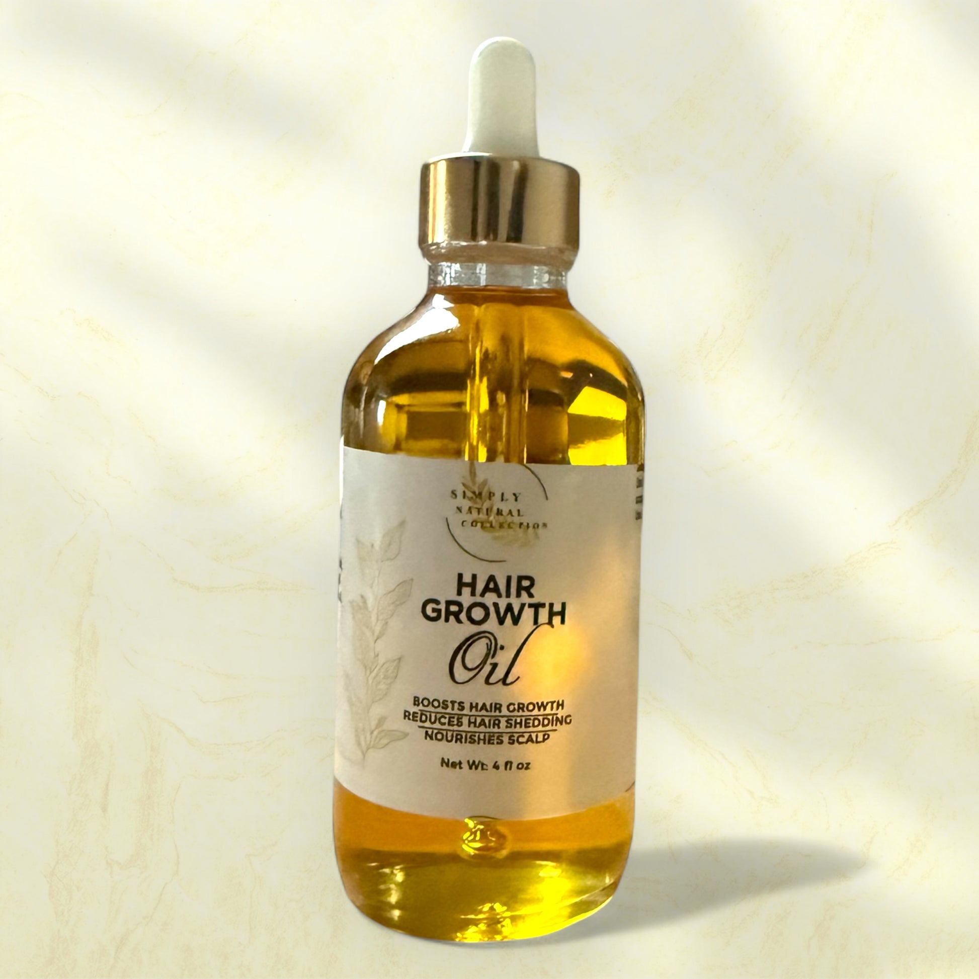 Hair growth oil bottle with dropper on a light background