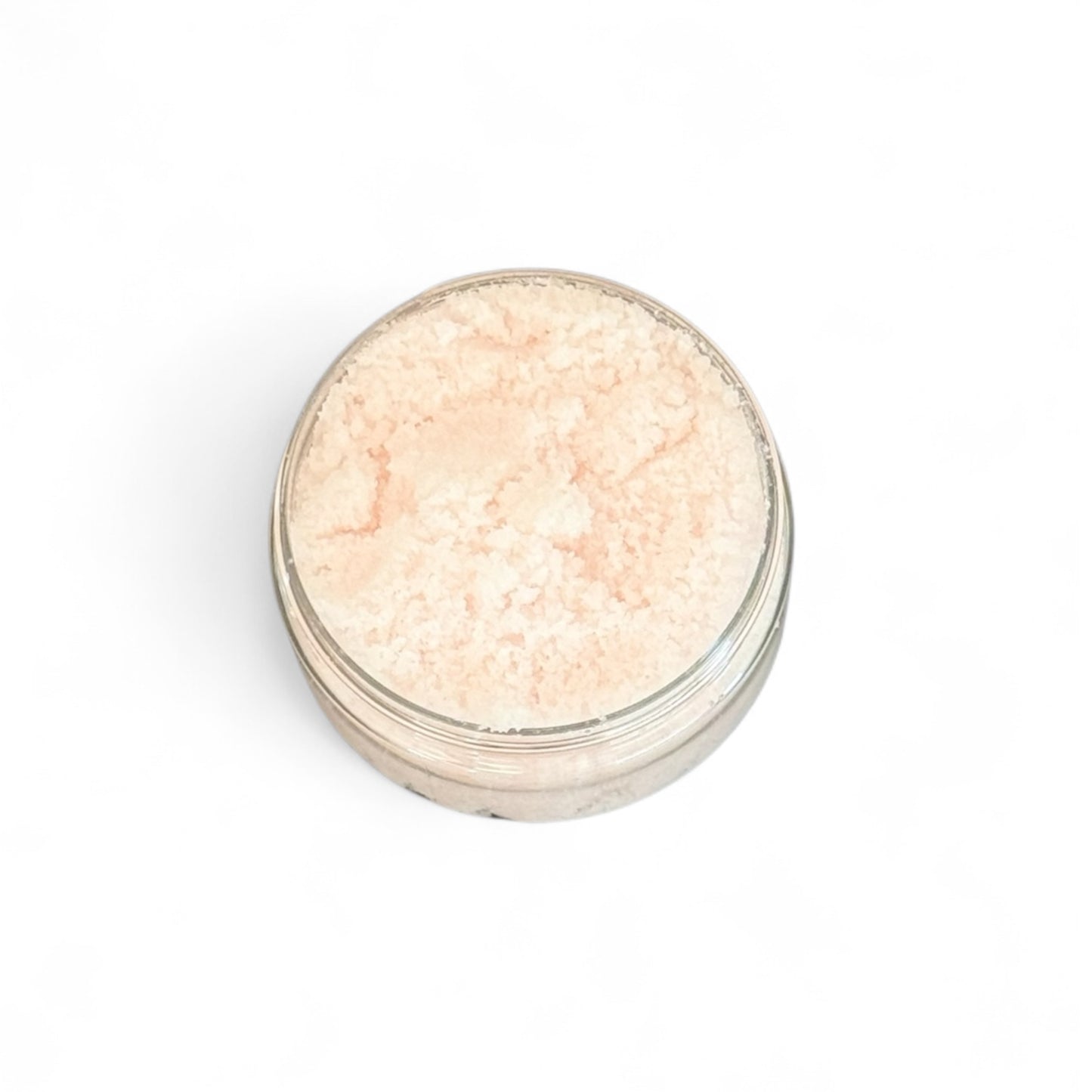Tropical Paradise Body Scrub  in a small round jar on a white background