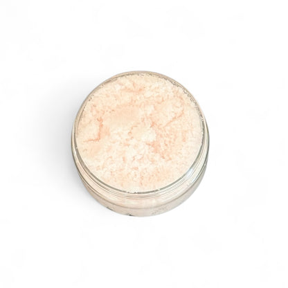 Tropical Paradise Body Scrub  in a small round jar on a white background