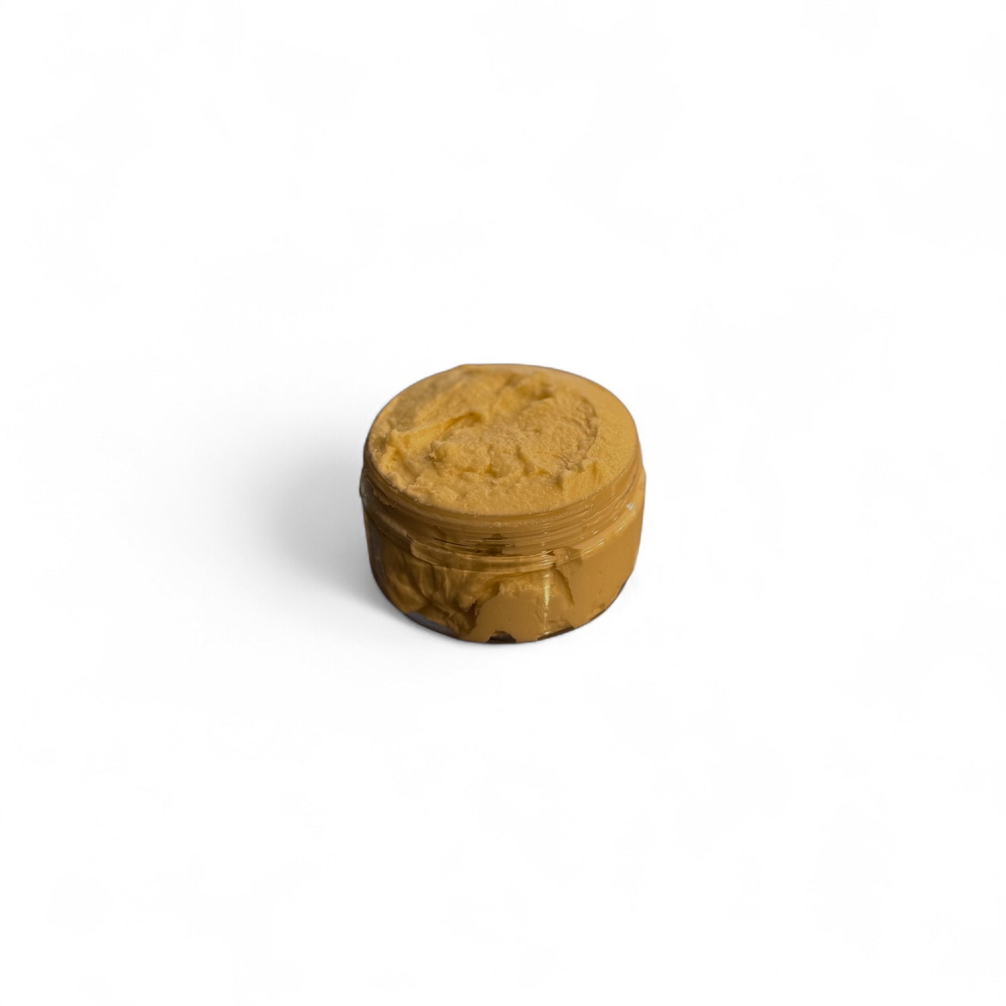 "Open jar of unscented body butter with creamy texture, ideal for sensitive skin and fragrance-free hydration."
