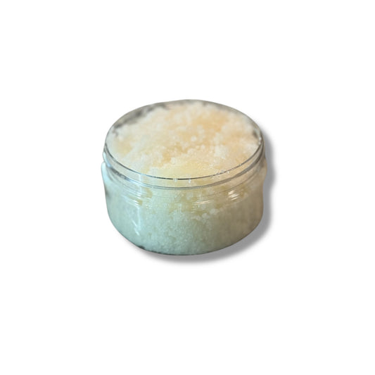  open Jar of beige-colored  baby powder body scrub on a white background
