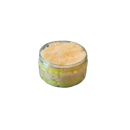  Open jar of Pineapple Papaya Body Scrub with a tropical blend of pineapple and papaya, designed to exfoliate and soften skin.